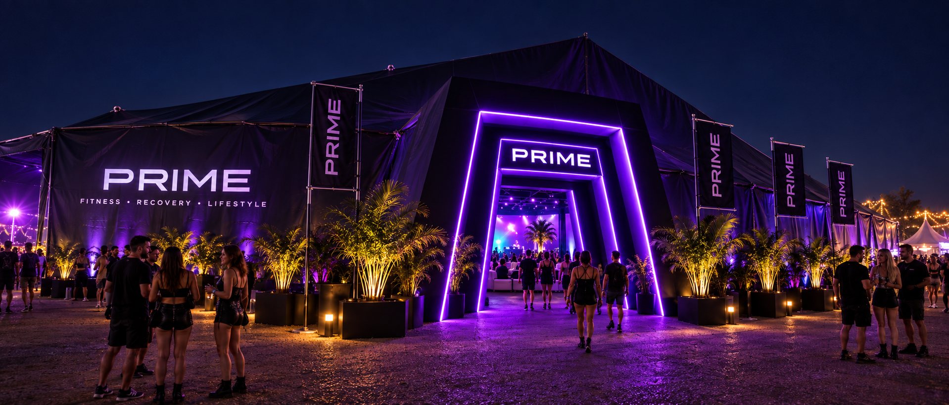 Eye-level concept view of the mobile PRIME festival tent and purple entrance gateway at night